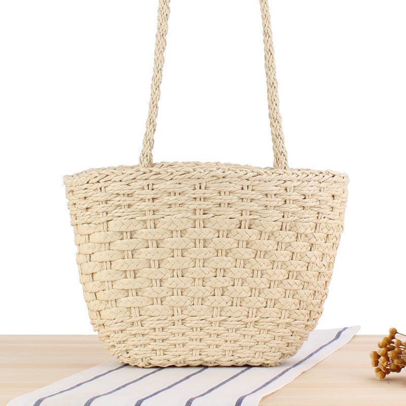 Braided handbag made of natural raffia with robust carrying straps Bowlift