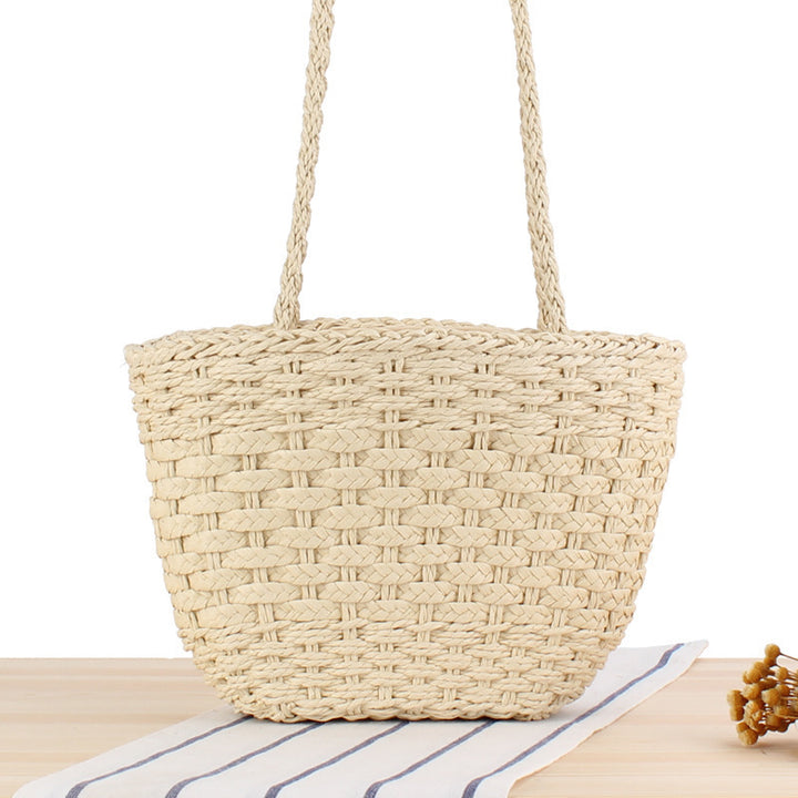 Braided handbag made of natural raffia with robust carrying straps Bowlift