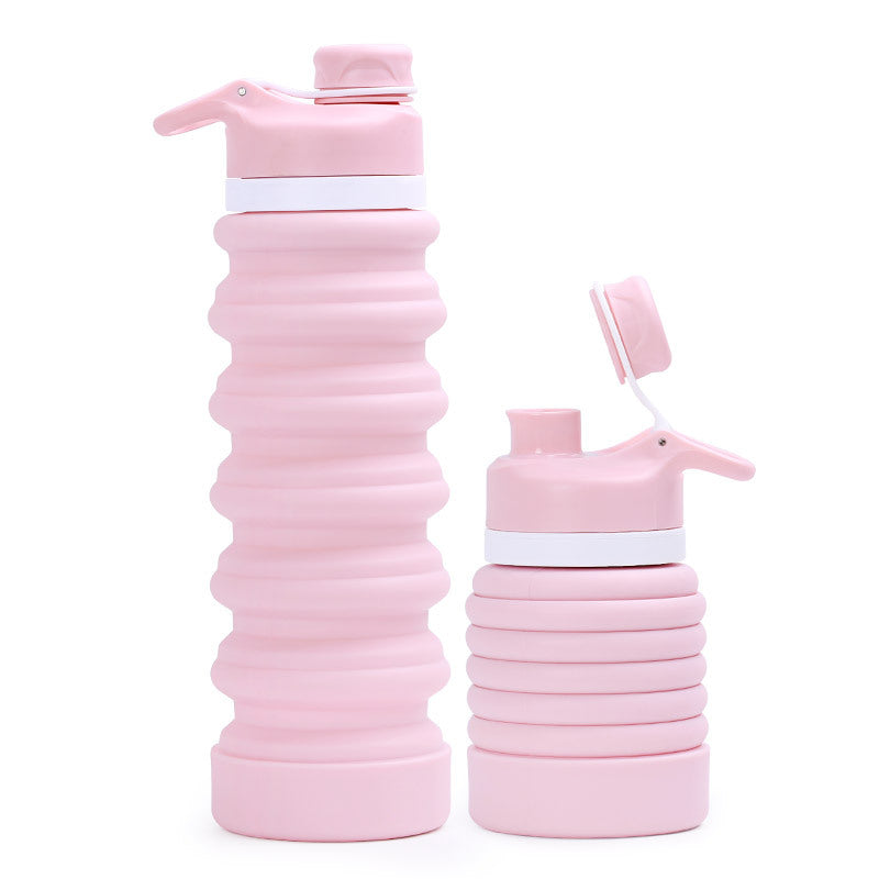 Collapsible silicone water bottle with ergonomic ribbed grip and flip-top spout Bowlift
