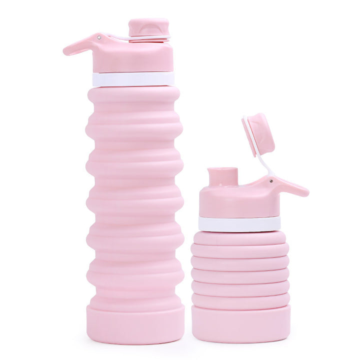 Collapsible silicone water bottle with ergonomic ribbed grip and flip-top spout Bowlift
