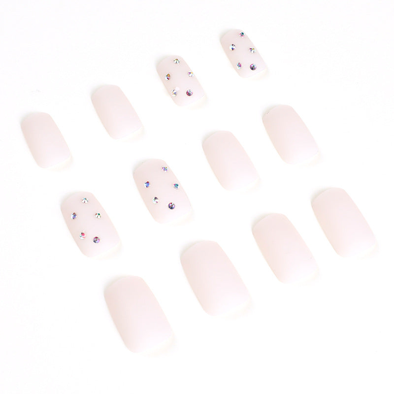 Artistic nail art with elegant rhinestone embellishments Bowlift