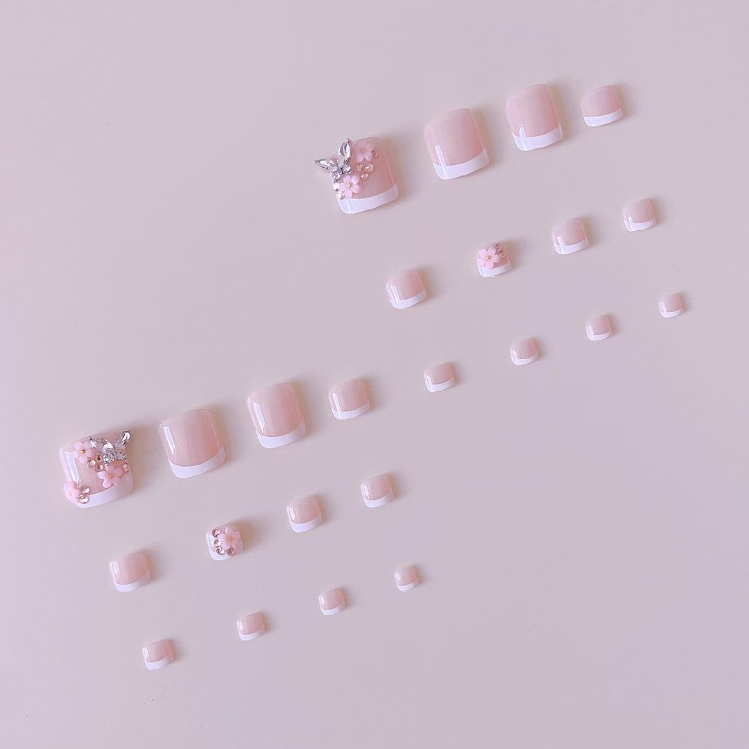 Acrylic nail set with elegant 3D flowers and glitter accents Bowlift