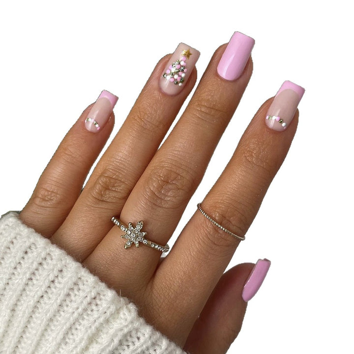Artificial nail set with festive Christmas tree design and glitter decorations Bowlift