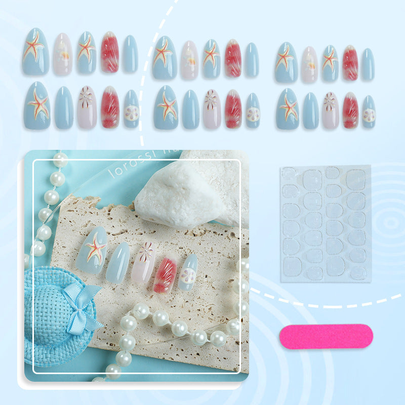 Artificial nails with maritime shell motifs Bowlift
