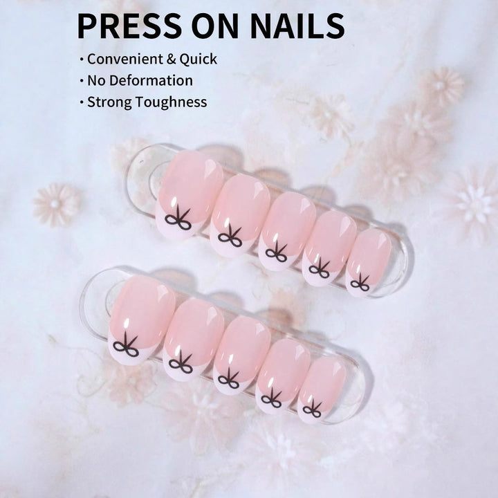 Artificial nails with elegant bows and high-gloss surface Bowlift