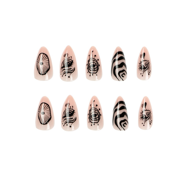 Artistic acrylic nails in elegant stiletto design with graphic patterns Bowlift