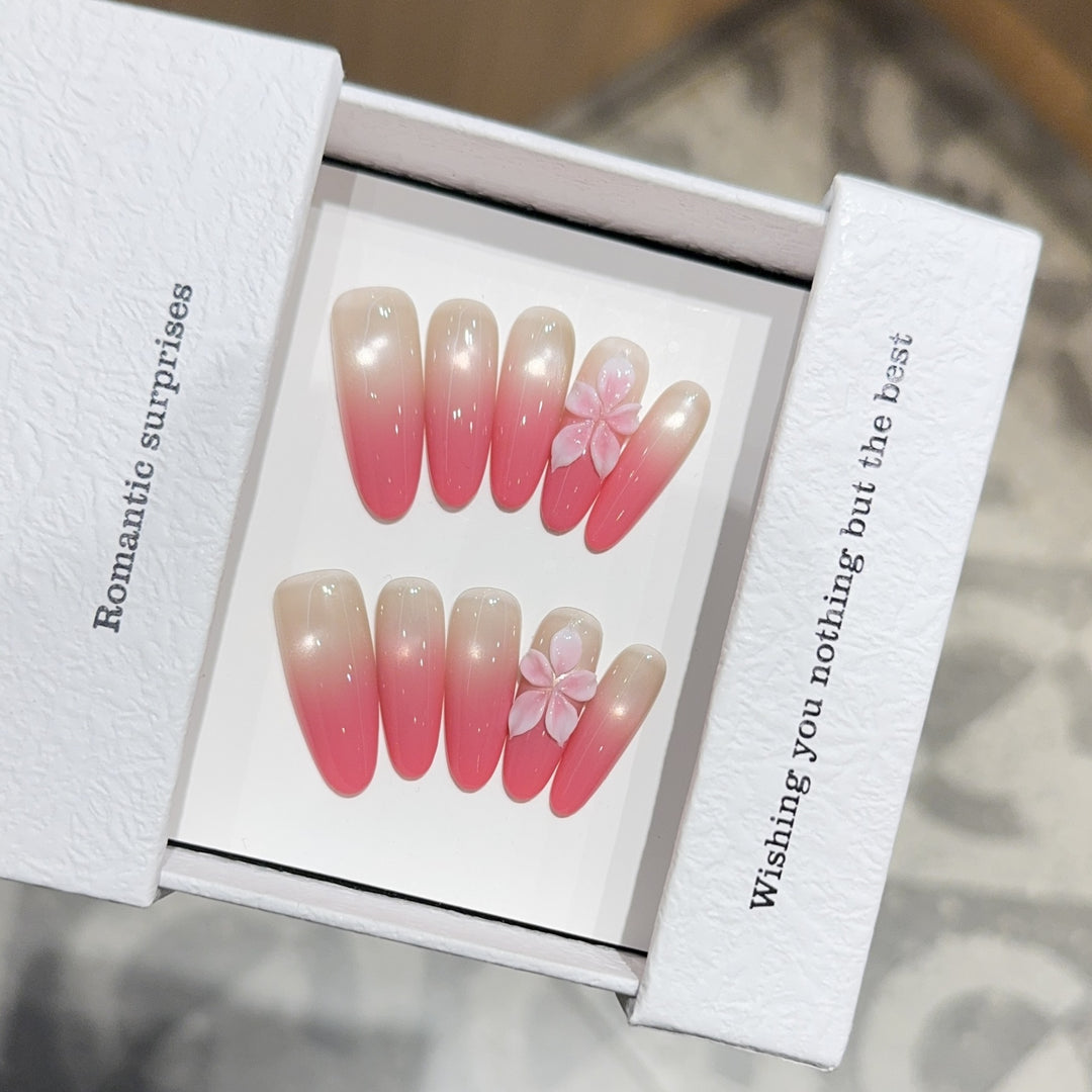 Artificial nails with romantic ombre design and floral accents Bowlift