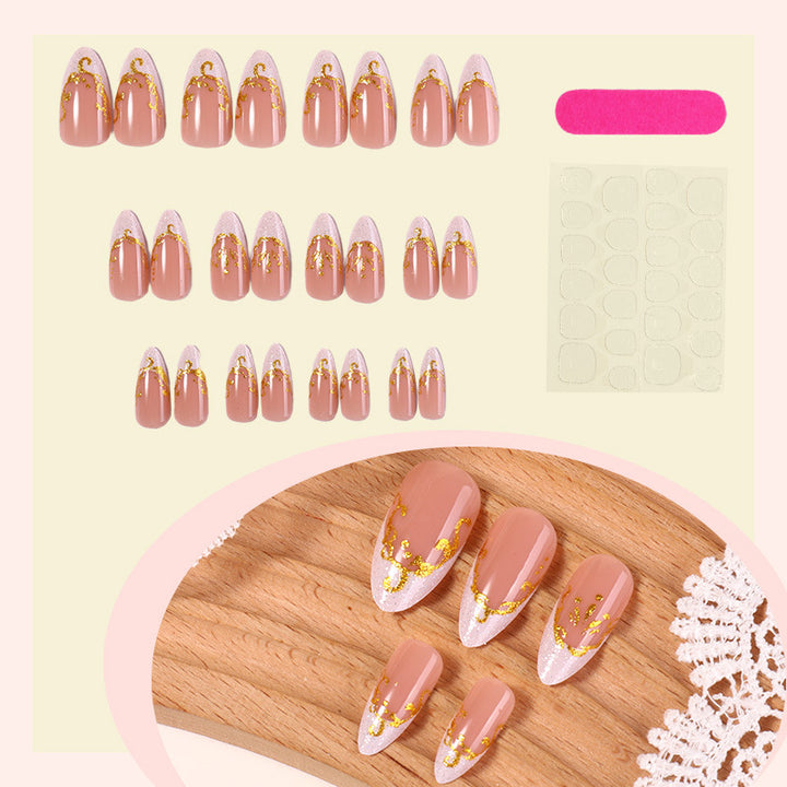 Artificial nail set with elegant gold accents and transparent design Bowlift