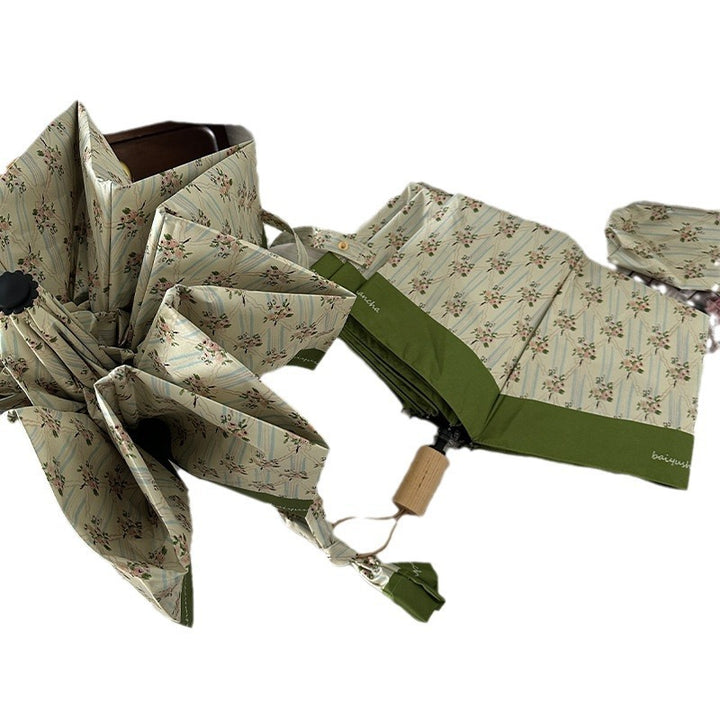 Ladies elegant folding umbrella with floral design Bowlift