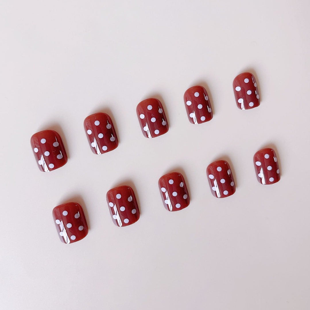 Acrylic nail set with stylish chocolate spots and elegant dots Bowlift