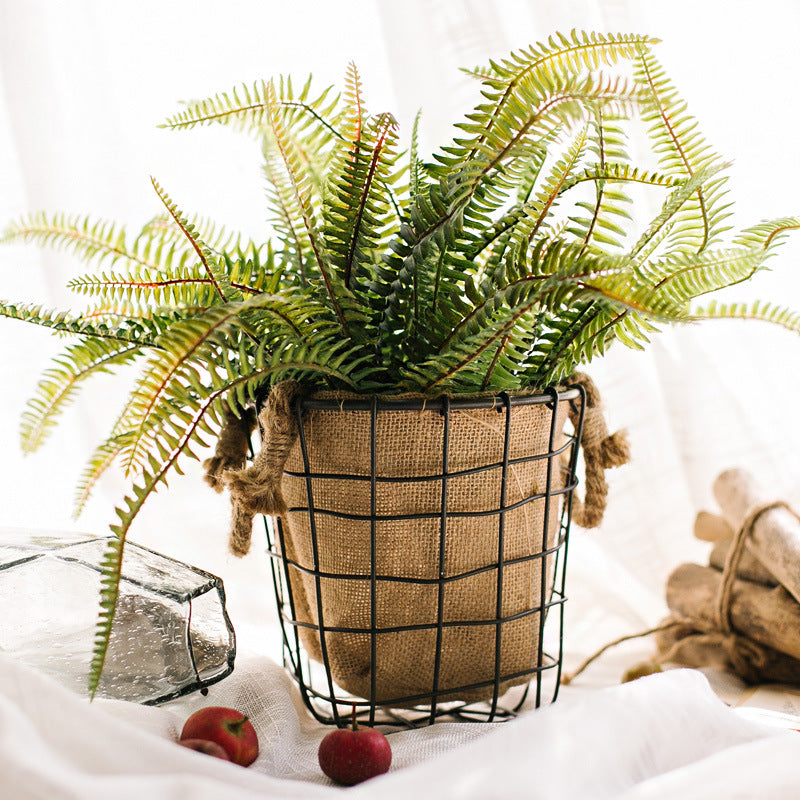Decorative storage basket made of wire and linen Bowlift