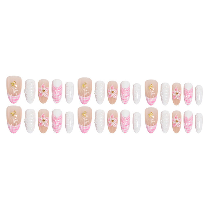 Artificial nail set with floral accents and glitter decorations Bowlift