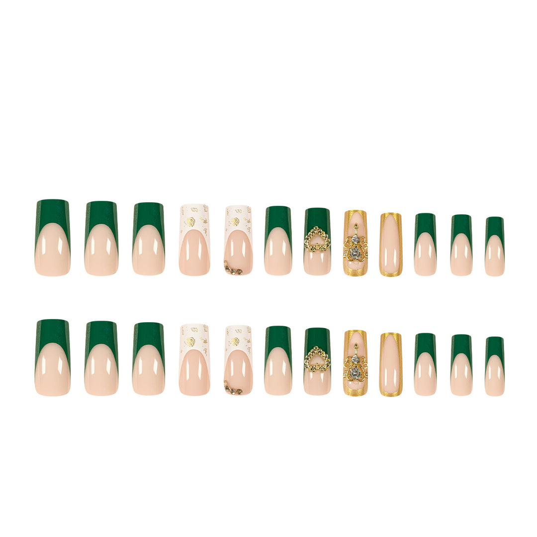 Exquisite artificial nails with gold embellishments and glitter accents Bowlift