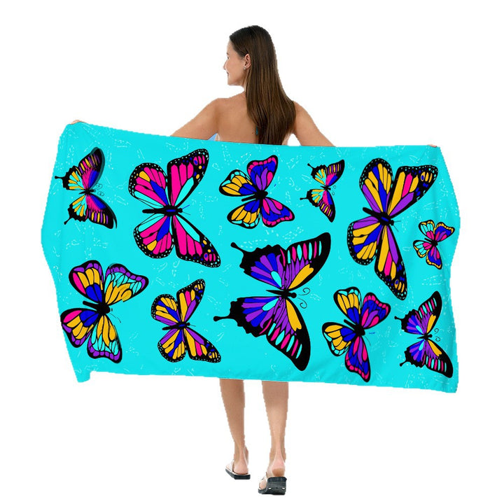 Beach towel with vibrant, colorful animal motif Bowlift