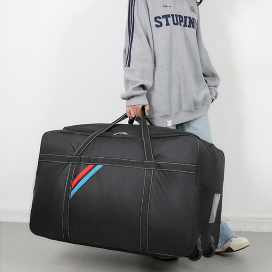 Spacious travel bag with lightweight wheels and reinforced carrying handle Bowlift