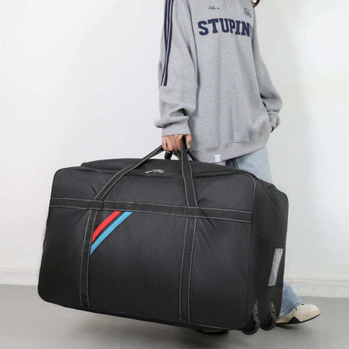 Spacious travel bag with lightweight wheels and reinforced carrying handle Bowlift