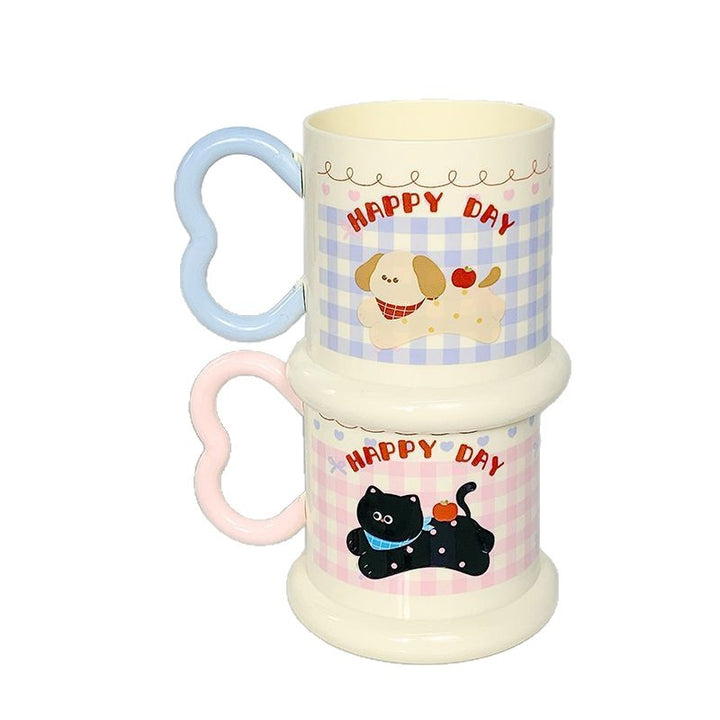 Ceramic mug with playful puppy motif Bowlift