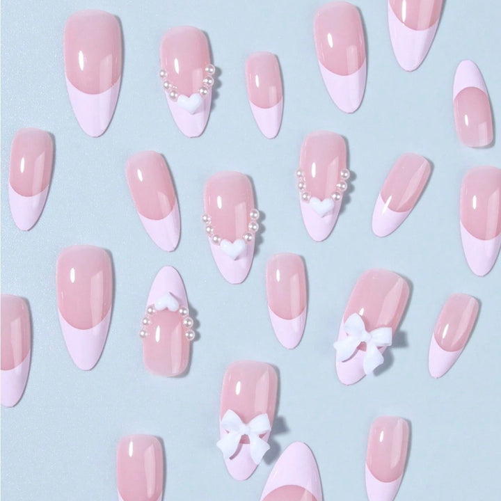 Artificial nail tips with heart and bow decorations Bowlift