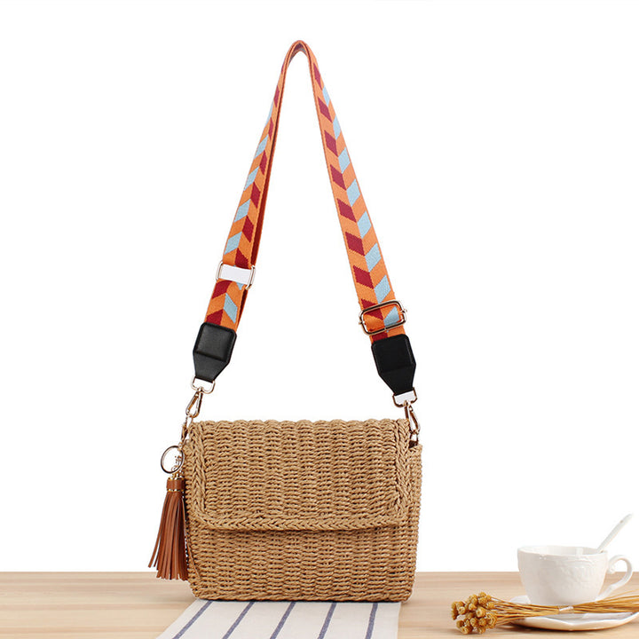 Woven Raffia Shoulder Bag with Decorative Shoulder Strap Bowlift