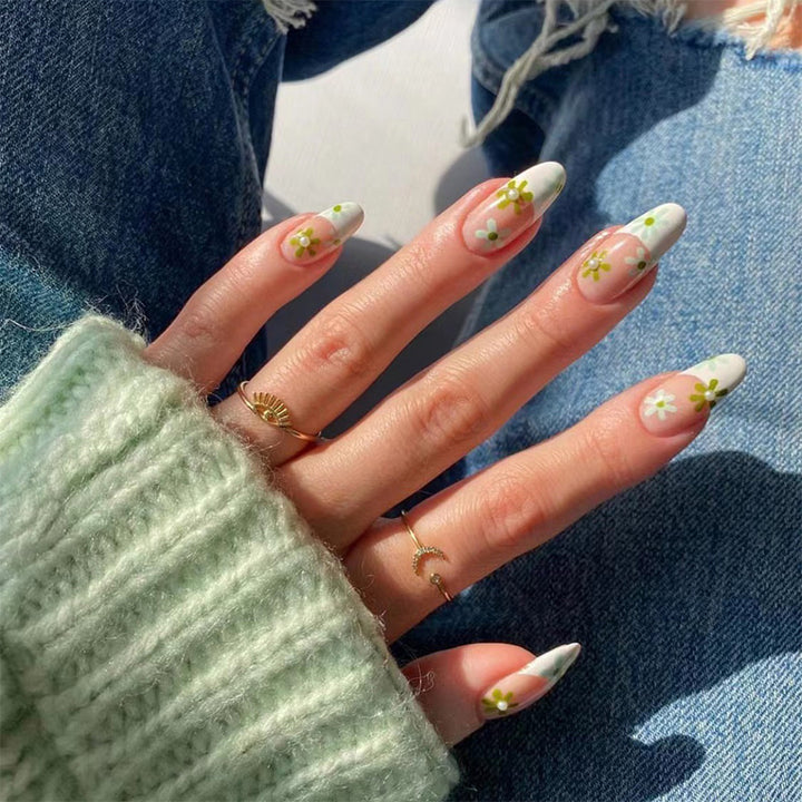 Artful nail art with delicate floral motifs Bowlift