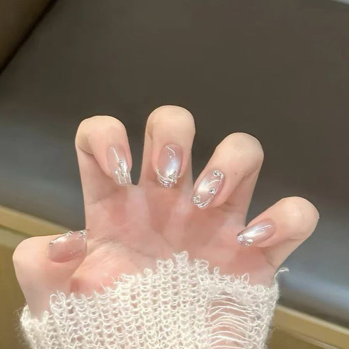Artificial nails with glamorous rhinestone design Bowlift