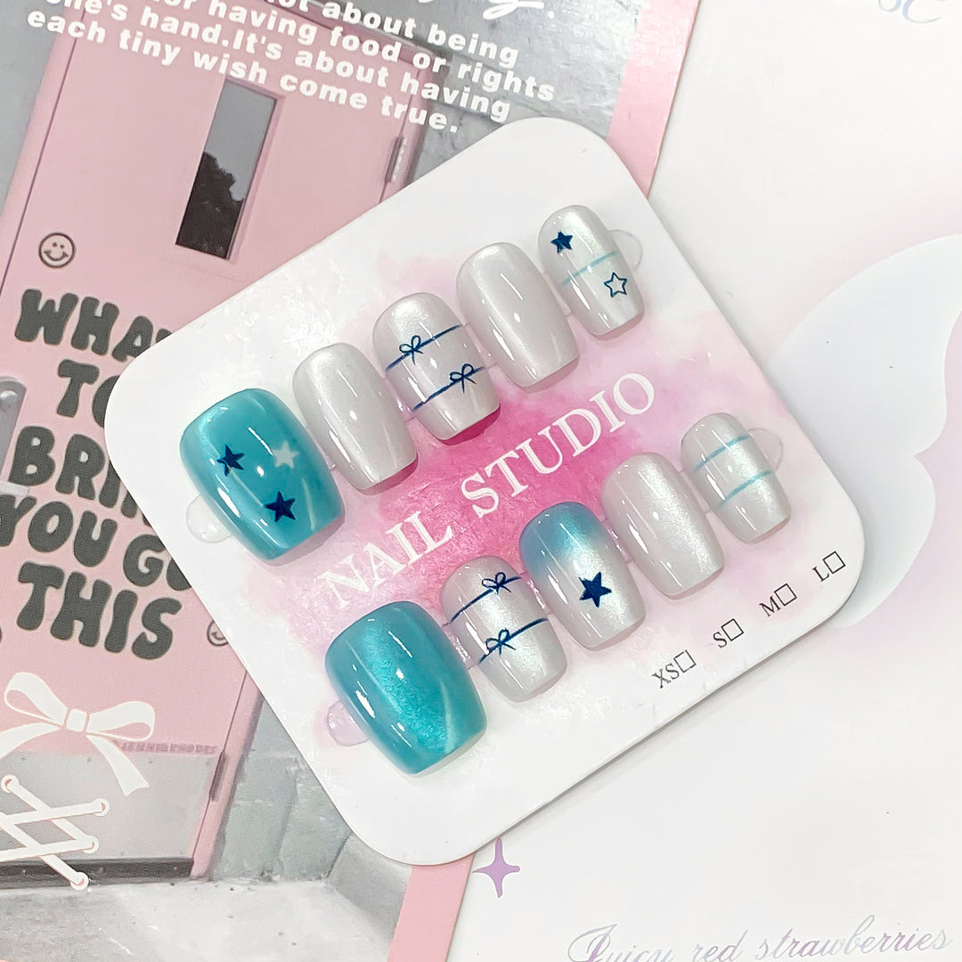 Artistic acrylic nails with star design Bowlift