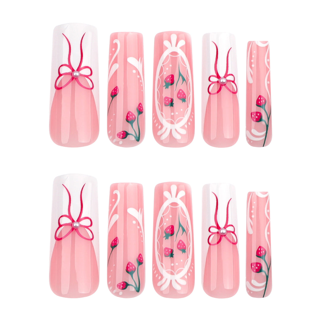 Artful nails with strawberry motifs and bow accents Bowlift