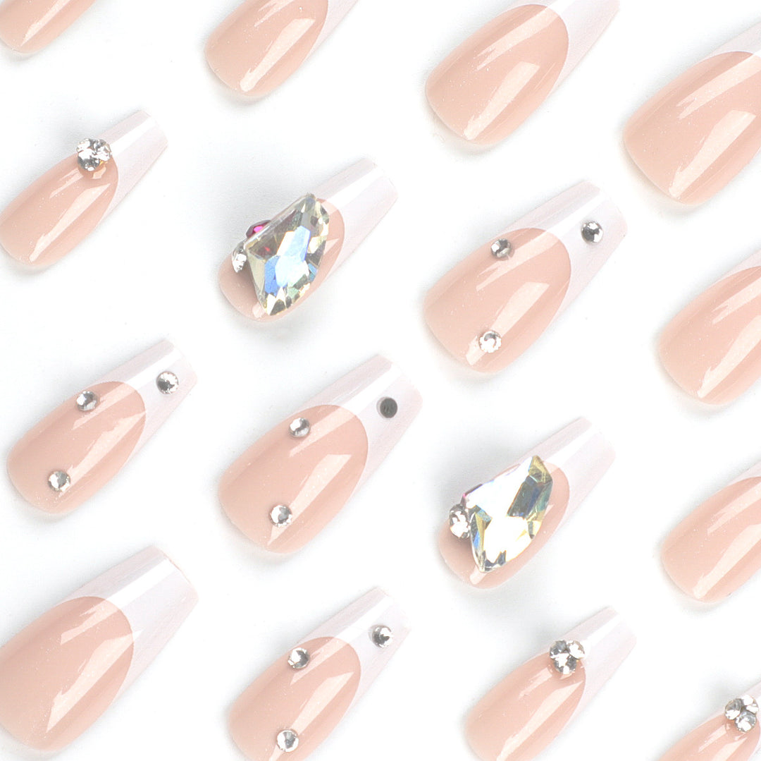 Artistic nail art with glitter accents and rhinestone embellishments Bowlift