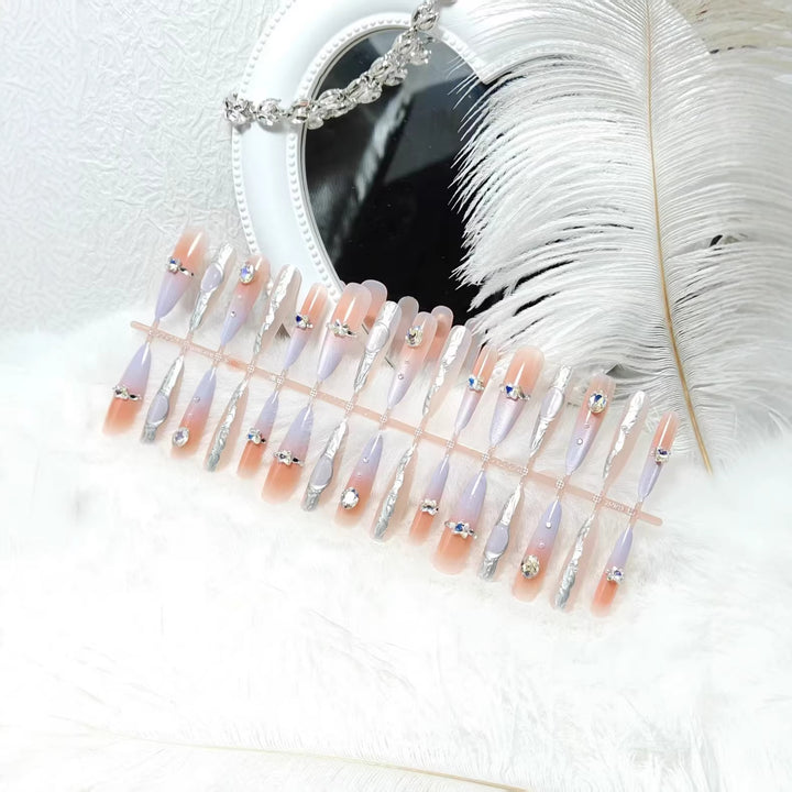 Artificial nails with elegant glitter design and fine 3D decorations Bowlift