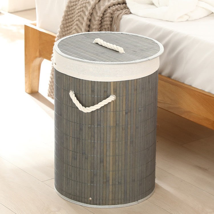 Laundry basket made of natural bamboo by Bowlift
