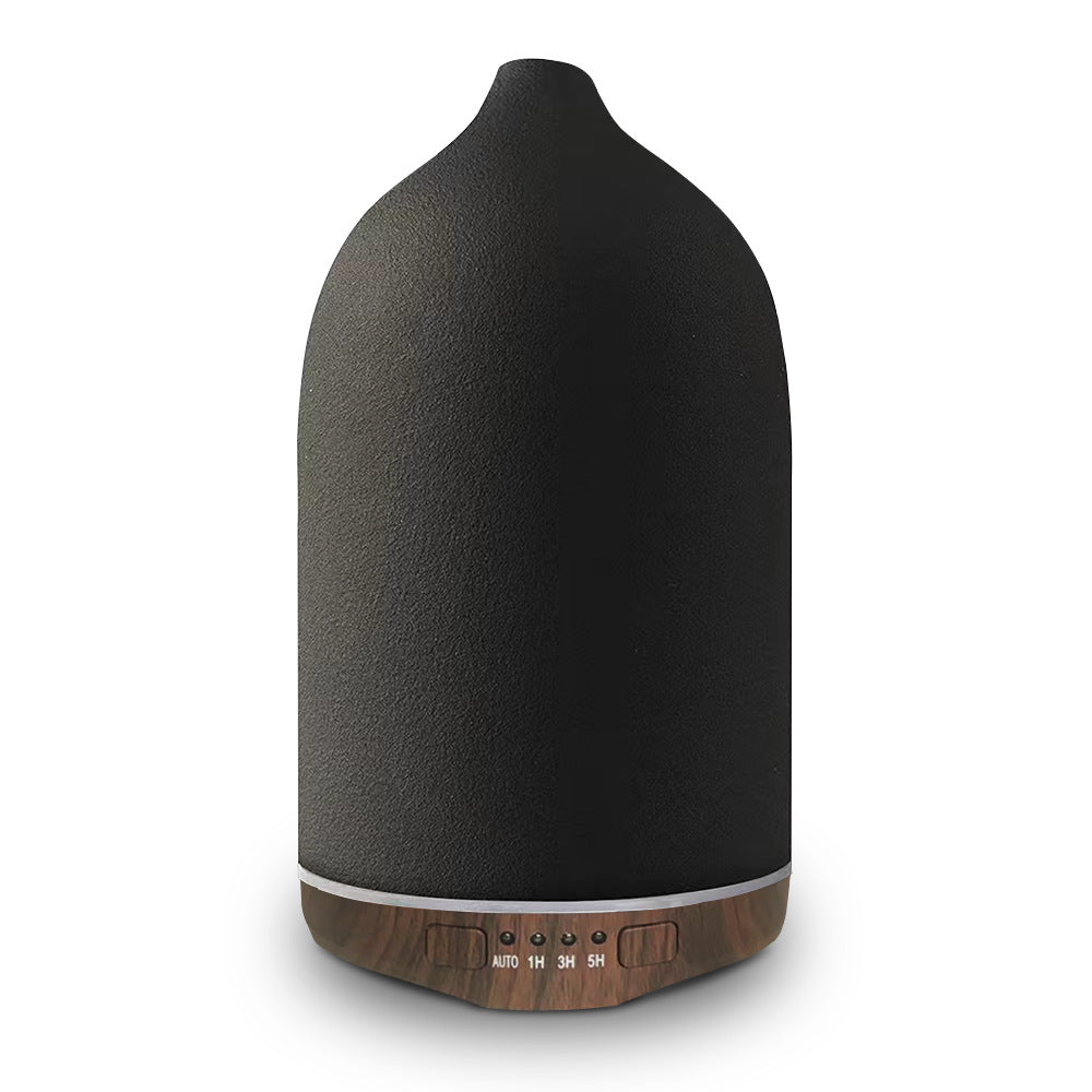 Ultrasonic essential oil diffuser with wood grain base and matte textured ceramic cover Bowlift