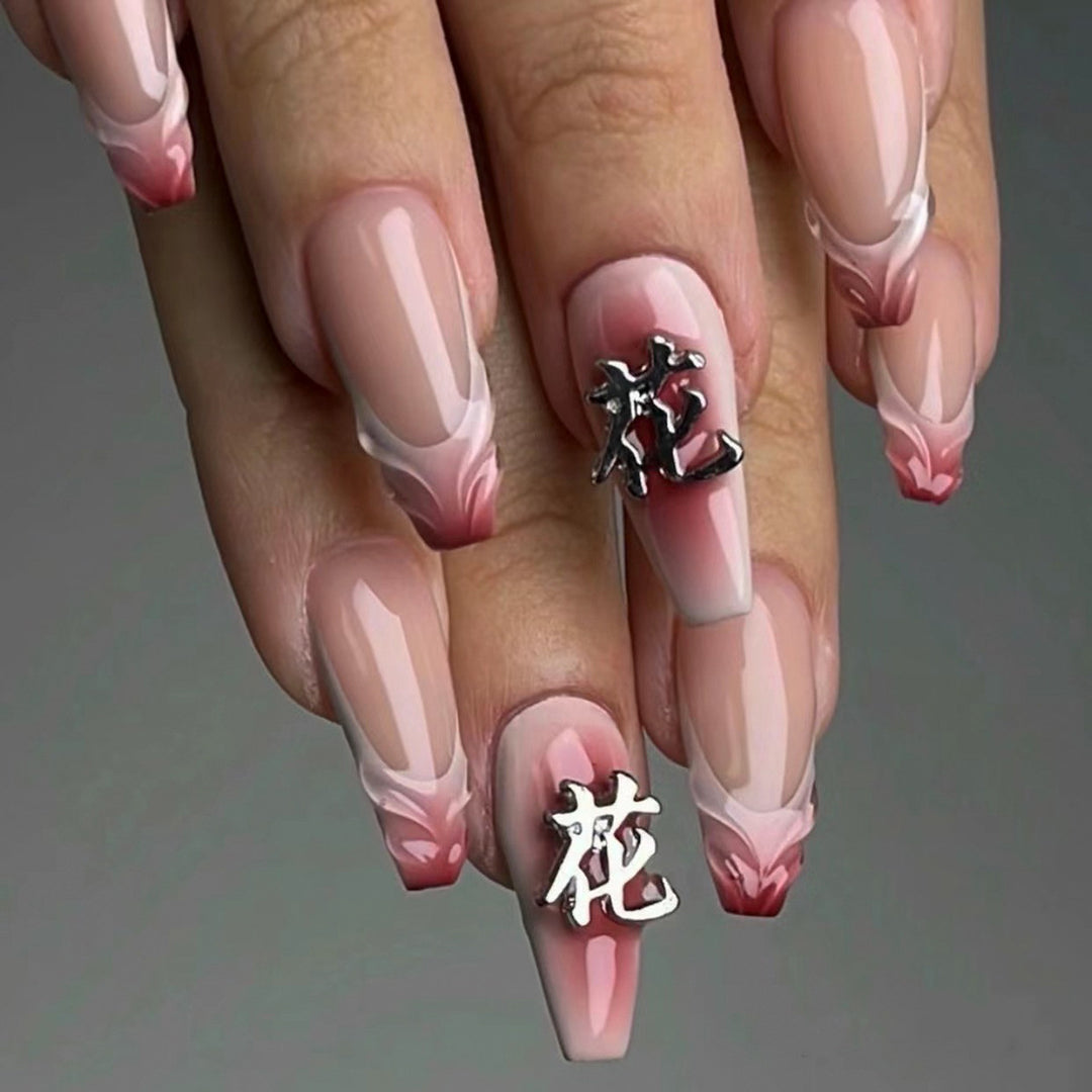 Artful stiletto nails with floral accents and 3D details Bowlift