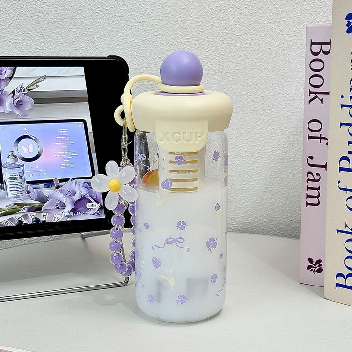 Women's bottle with integrated fruit infuser and Bowlift keychain