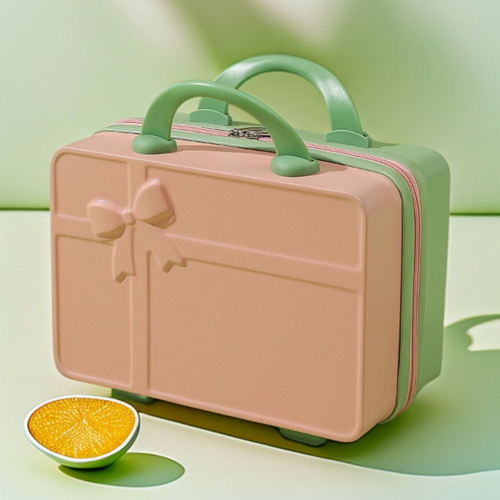 structured hard-shell cosmetic travel case with embossed bow and dual top handles Bowlift