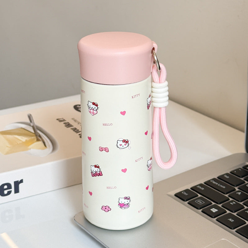 Women’s insulated drinking bottle with practical carrying strap and playful design Bowlift