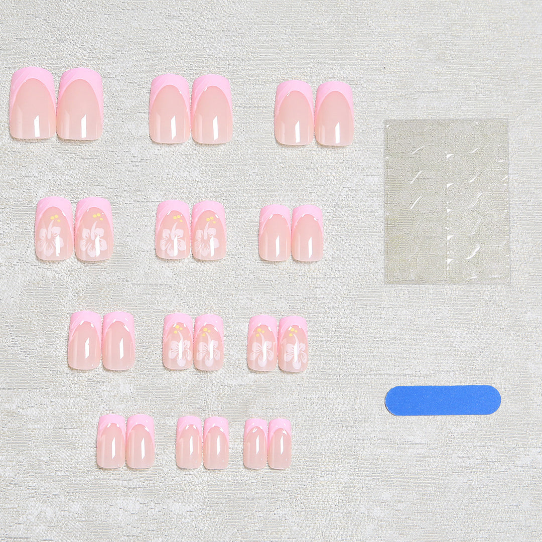 Artificial nail set with floral applications and elegant accents Bowlift