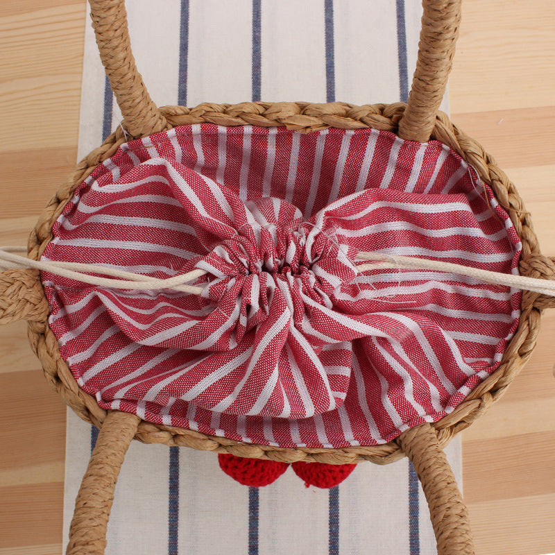 Basket bag with crocheted cherry design Bowlift