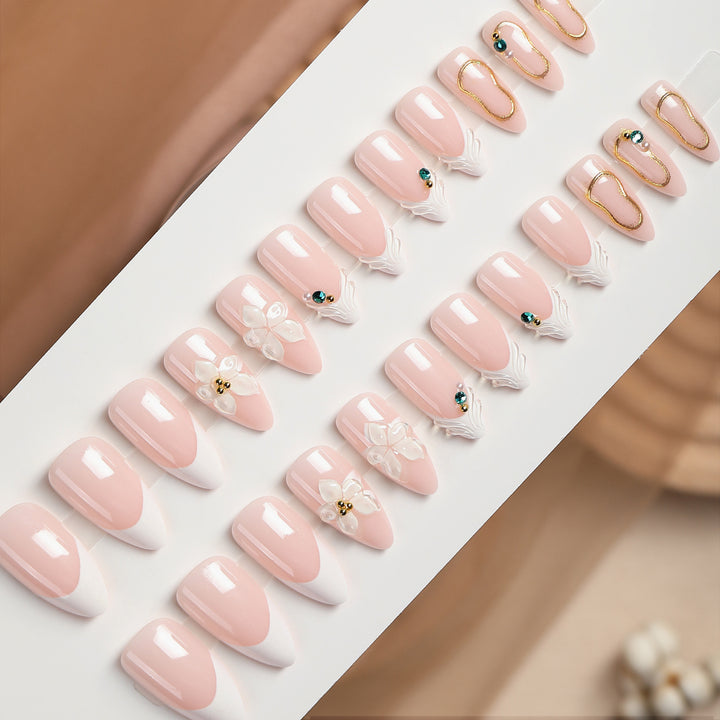 Acrylic nail set with elegant flower and rhinestone decorations Bowlift