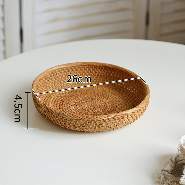 Round serving platter made of braided rattan Bowlift