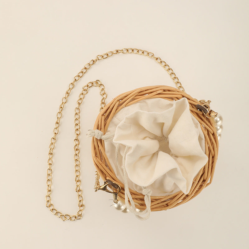 Women's elegant basket bag with pearl chain Bowlift