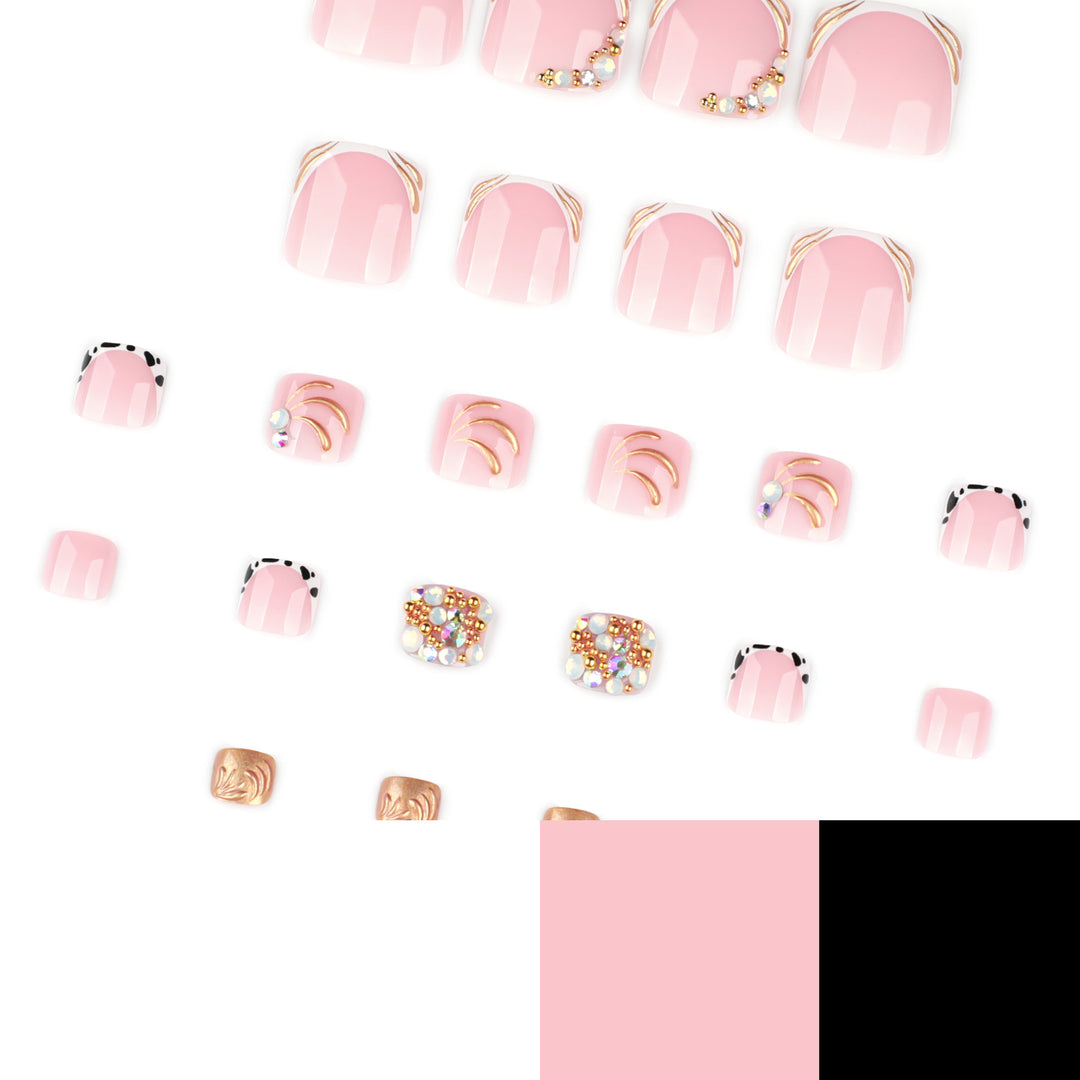 Artful toenail decoration with elegant gold accent Bowlift