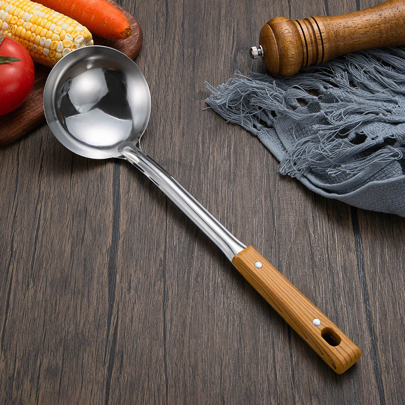 Slotted stainless steel turner spatula with ergonomic wooden handle Bowlift