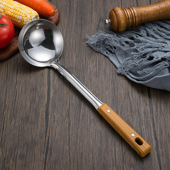 Slotted stainless steel turner spatula with ergonomic wooden handle Bowlift