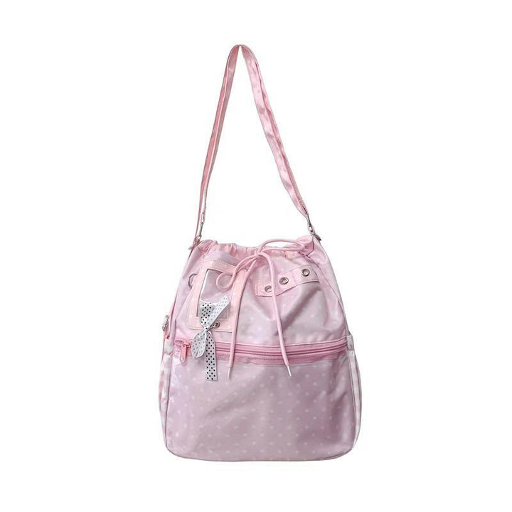 Shoulder bag with practical compartments and playful design Bowlift