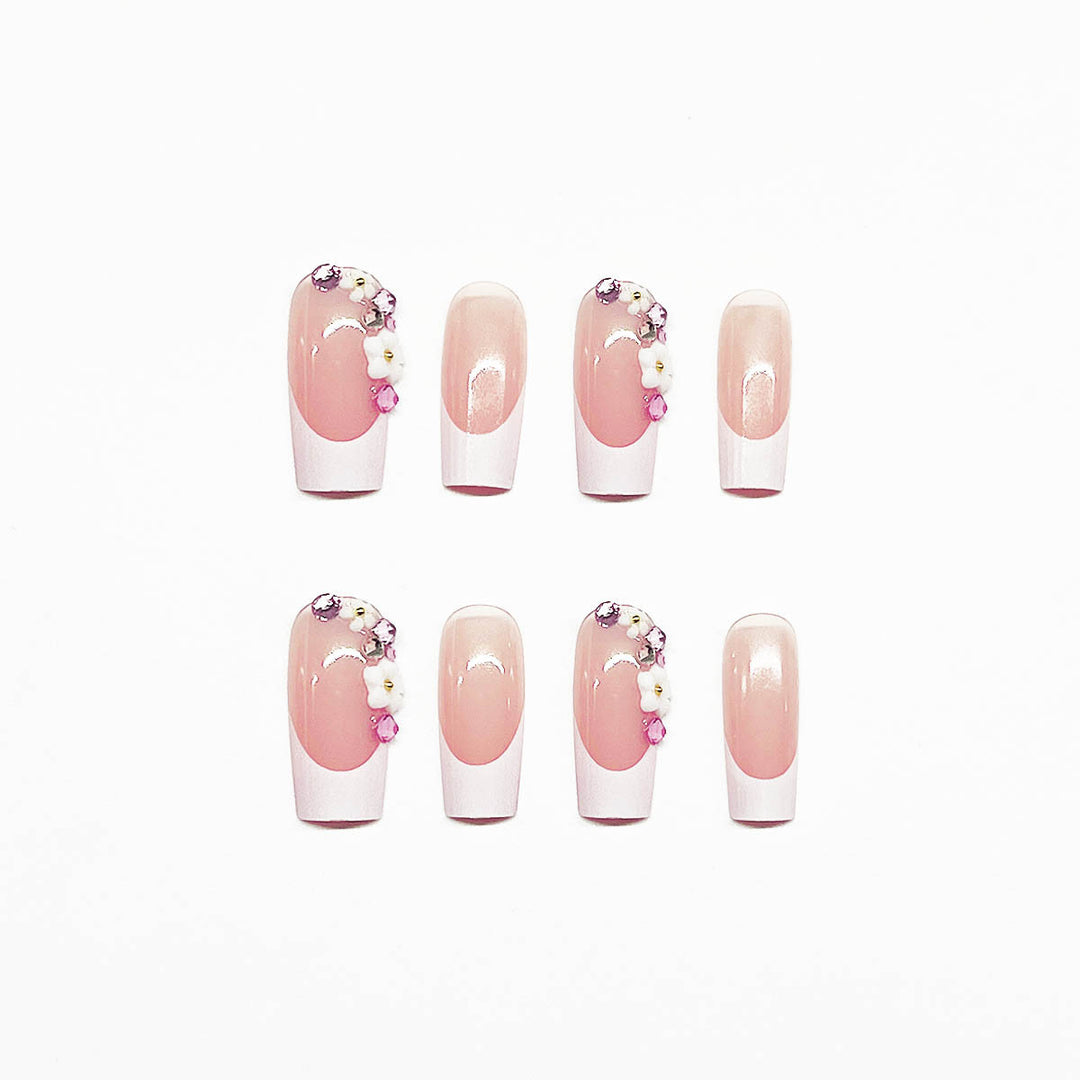 Artificial nail set with elegant floral decorations and transparent finish Bowlift