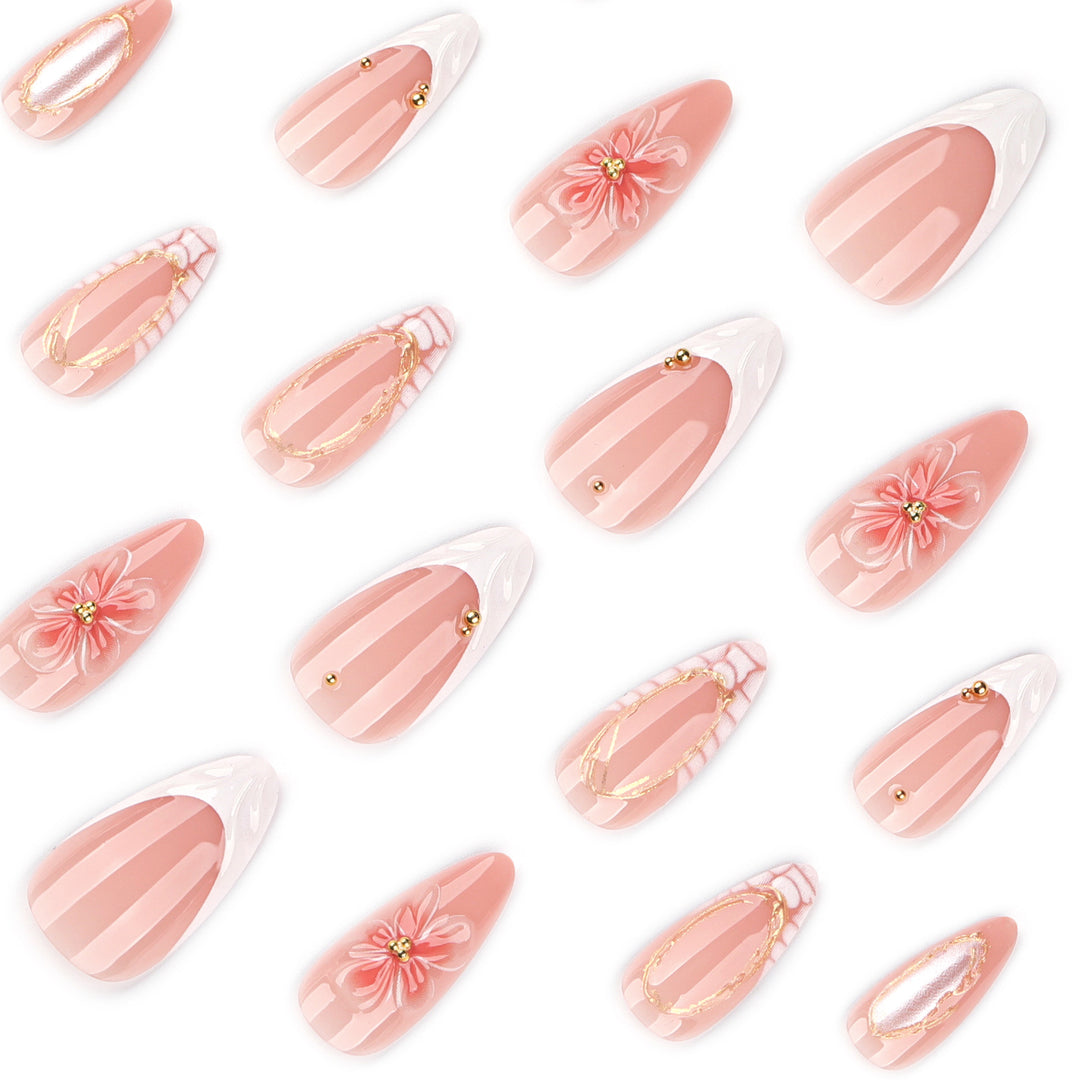 Artful nail art with floral and golden accents Bowlift