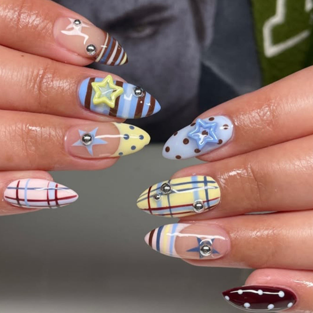 Decorative Stiletto Nail Art with Star Accents Bowlift