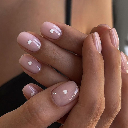 Fake nails with heart decoration Bowlift