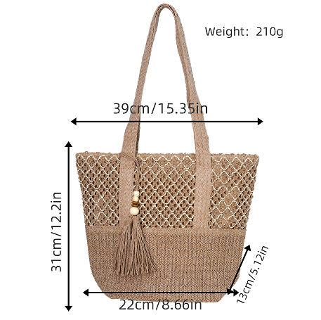 Beach bag with mesh structure and tassel details Bowlift