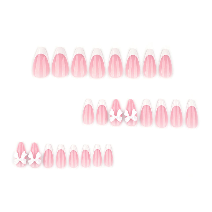 Artful nail designs with elegant tips and delicate bow motifs Bowlift